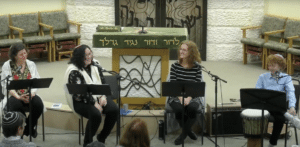 Rebecca Gross, Rabbi Megdal, Kristin Rosner, and Noah Rosner leading Yedid Nefesh on November 18, 2022